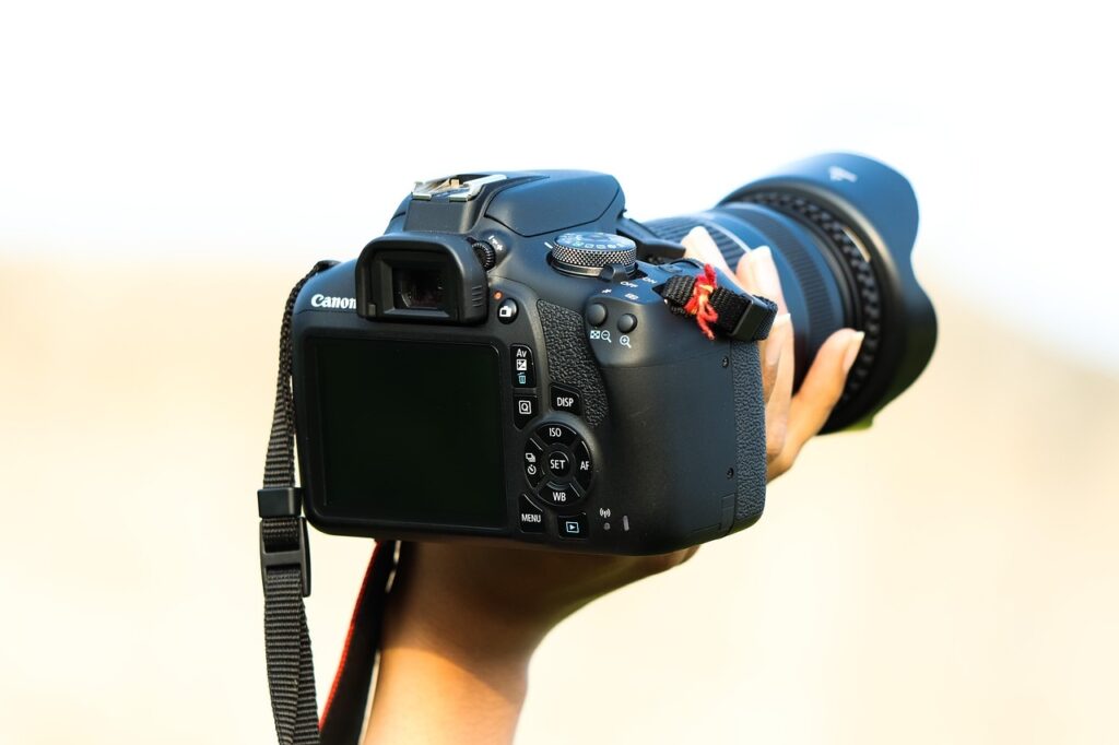 Man holding camera for portable photography